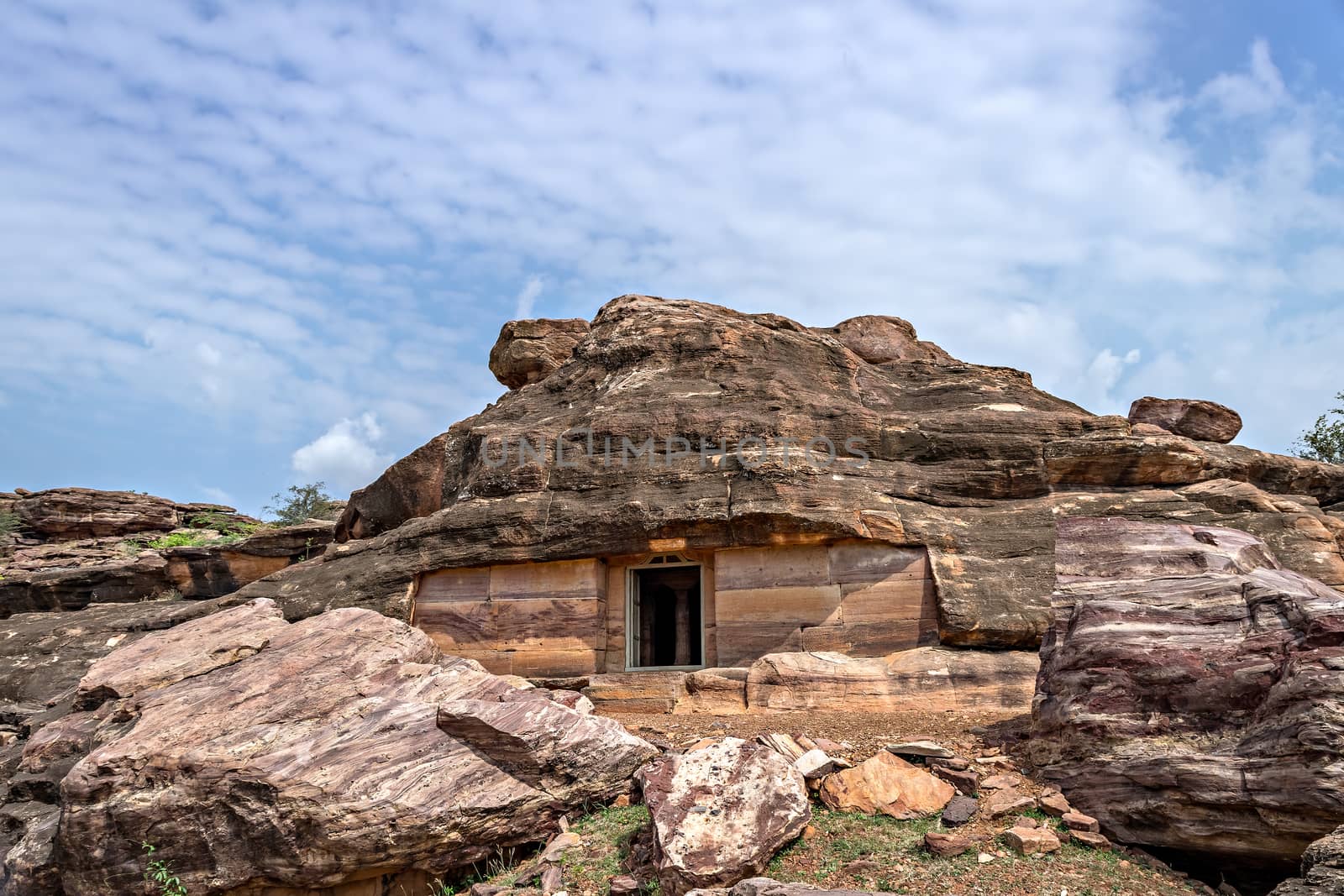Jain cave temple in the south of Aihole village, on the Meguti hill,Karnataka,India. It is likely from the late 6th century or early 7th. The outside is plain, but the cave is intricately embellished inside.