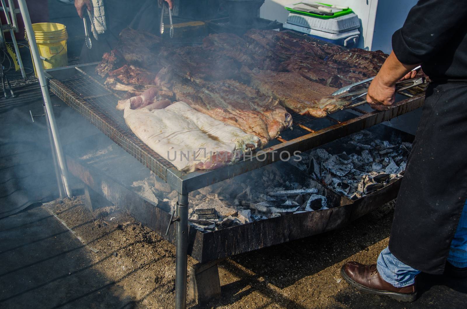 Peruvian food: roasted pork with charcoal or stick