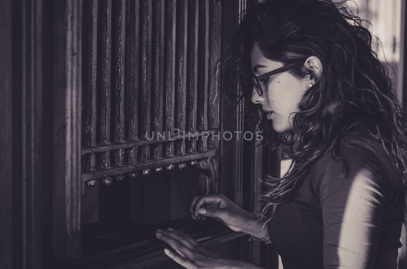 Woman buying tickets for train or for the excursion to the ancient city