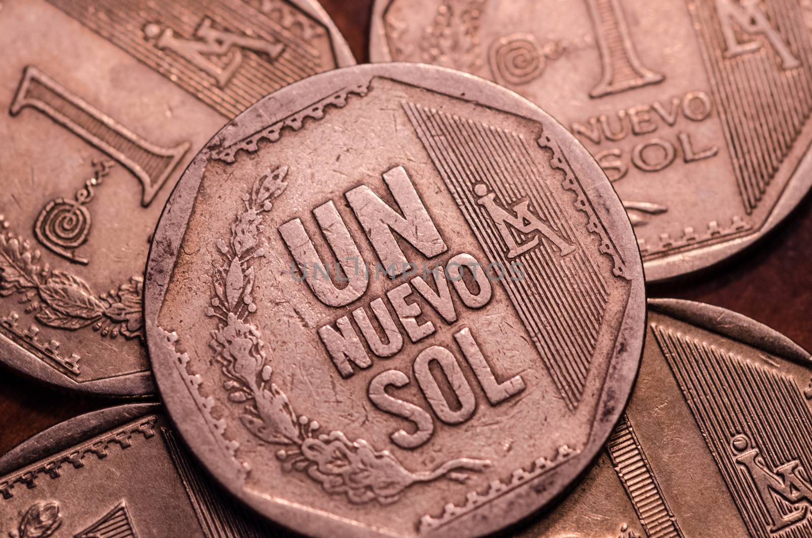 1 Peruvian nuevo sol coin isolated on black background