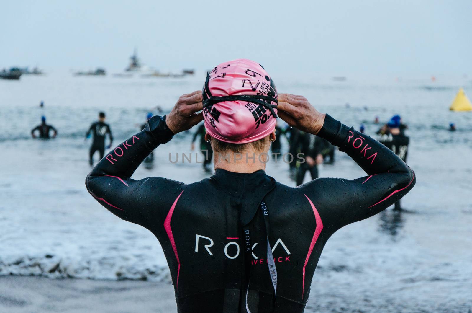 LIMA, PERU - APRIL 22th 2018: Ironman 70.3 . Athlete preparing for the competition and enter to swim
