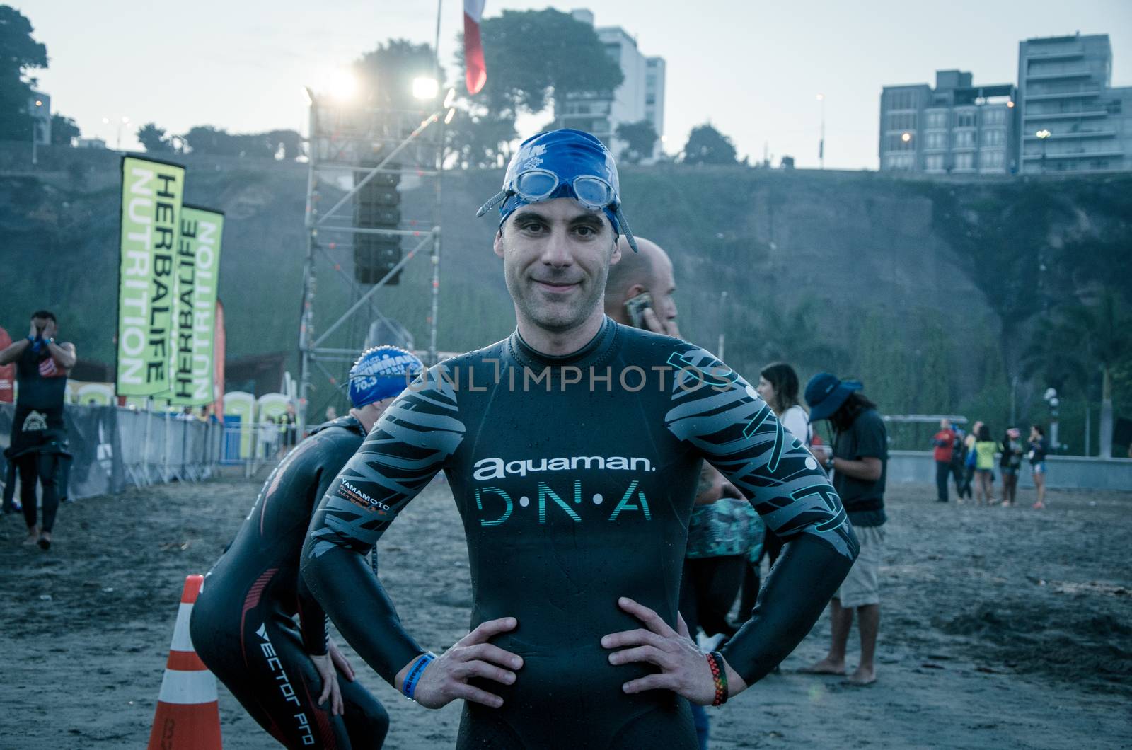 LIMA, PERU - APRIL 22th 2018: Ironman 70.3 . Athlete preparing for the competition and enter to swim