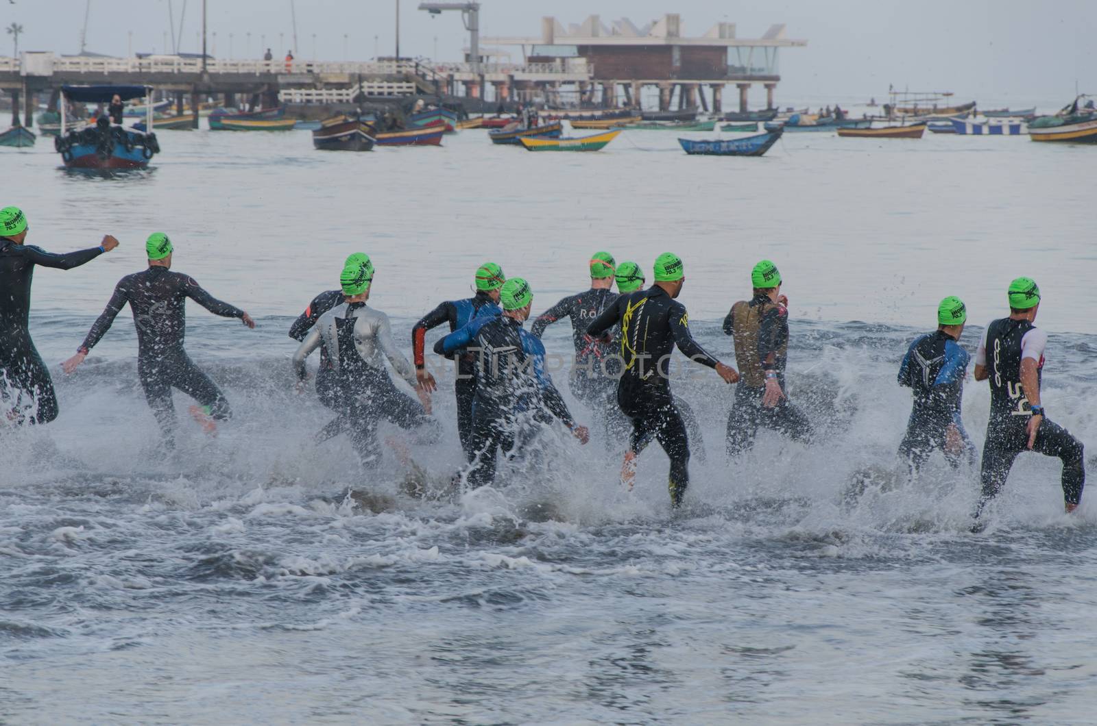 LIMA, PERU - APRIL 22th 2018: Ironman 70.3 . Starting for the swimming test of the athletes of the Ironman 70.3