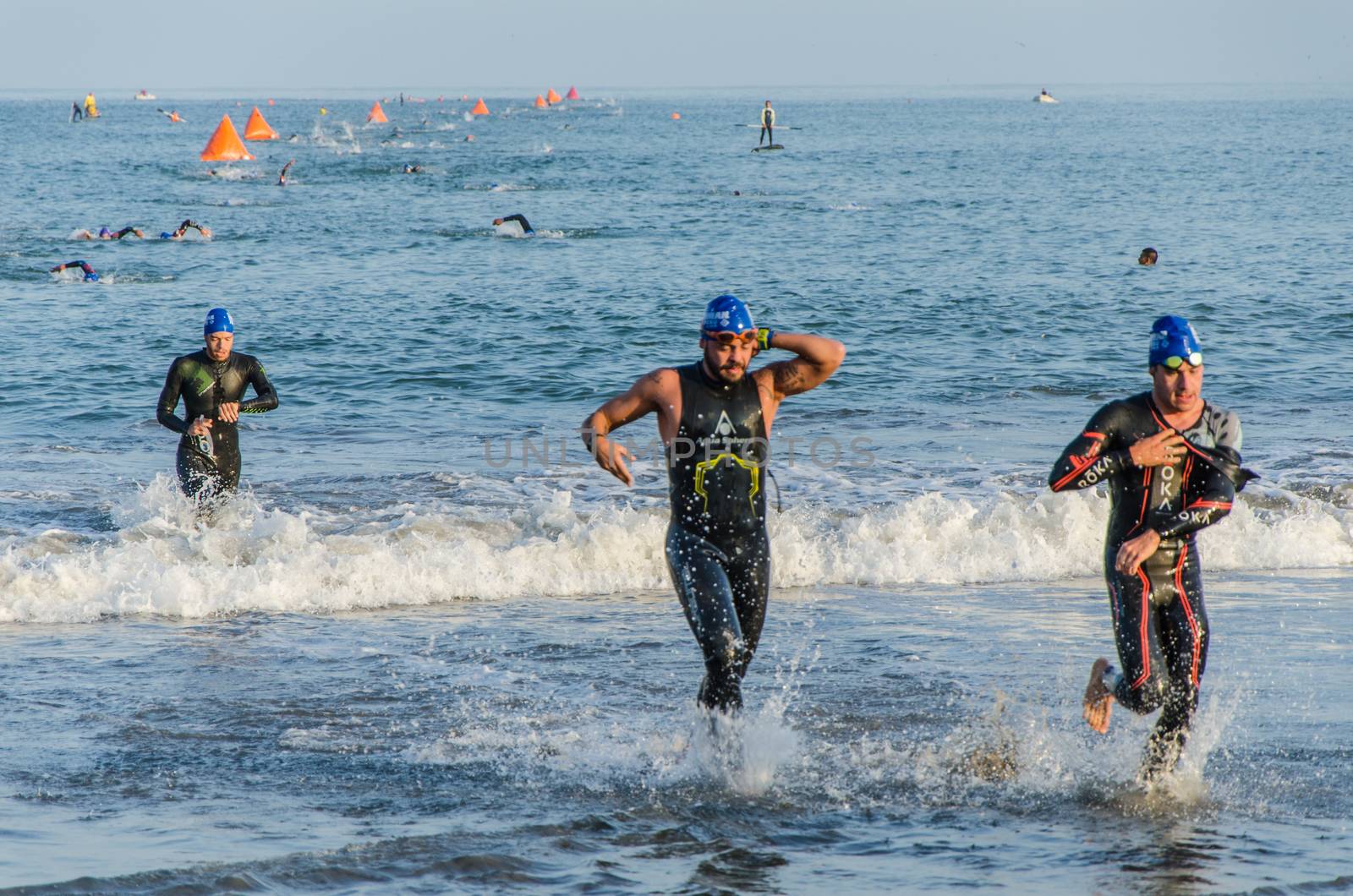 LIMA, PERU - APRIL 22th 2018: Ironman 70.3 . Starting for the swimming test of the athletes of the Ironman 70.3