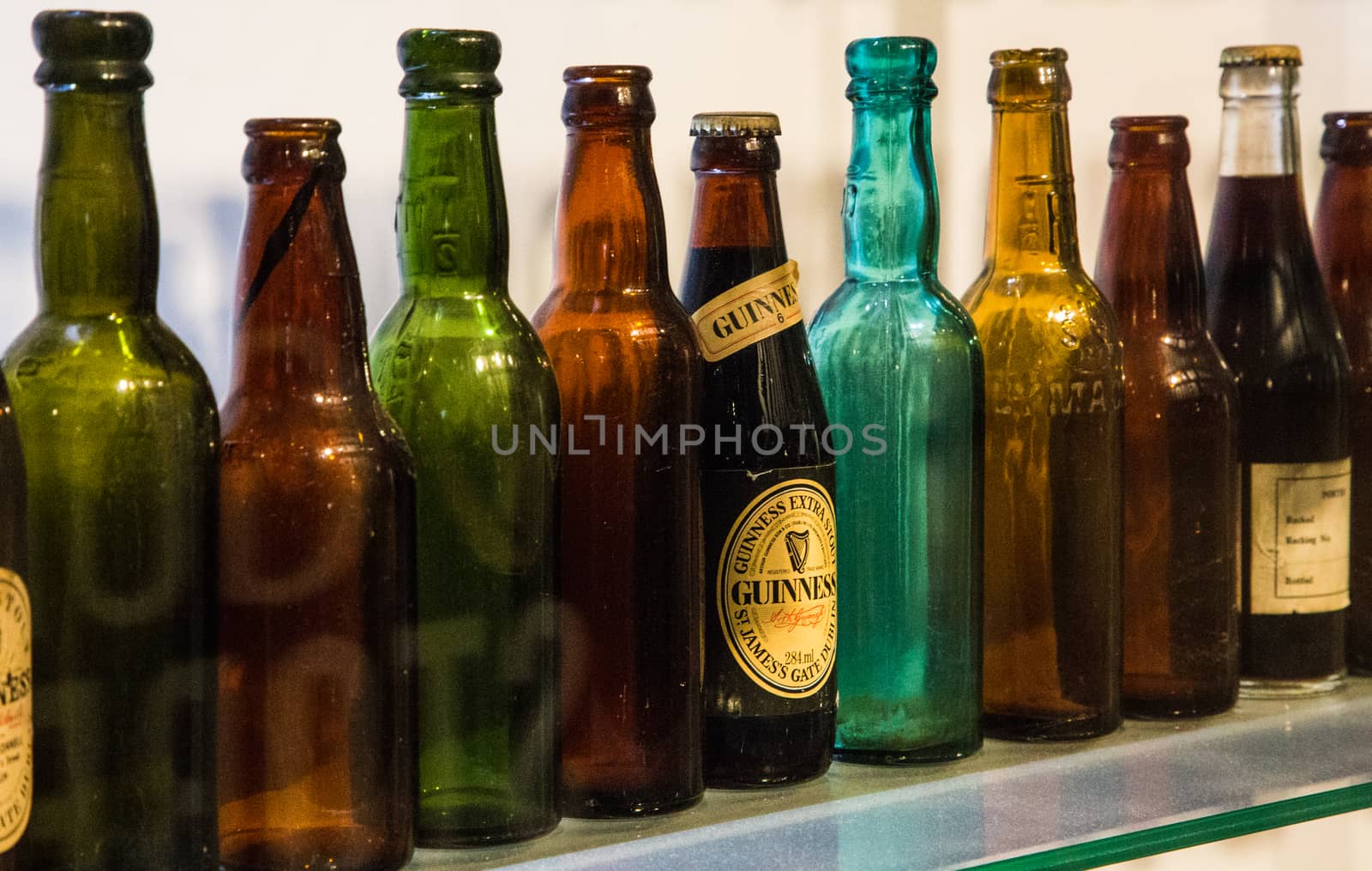 DUBLIN, IRELAND - JAN 21: Different beer bottles at the Guinness Storehouse Dublin Ireland Beer UK by mlechanteur