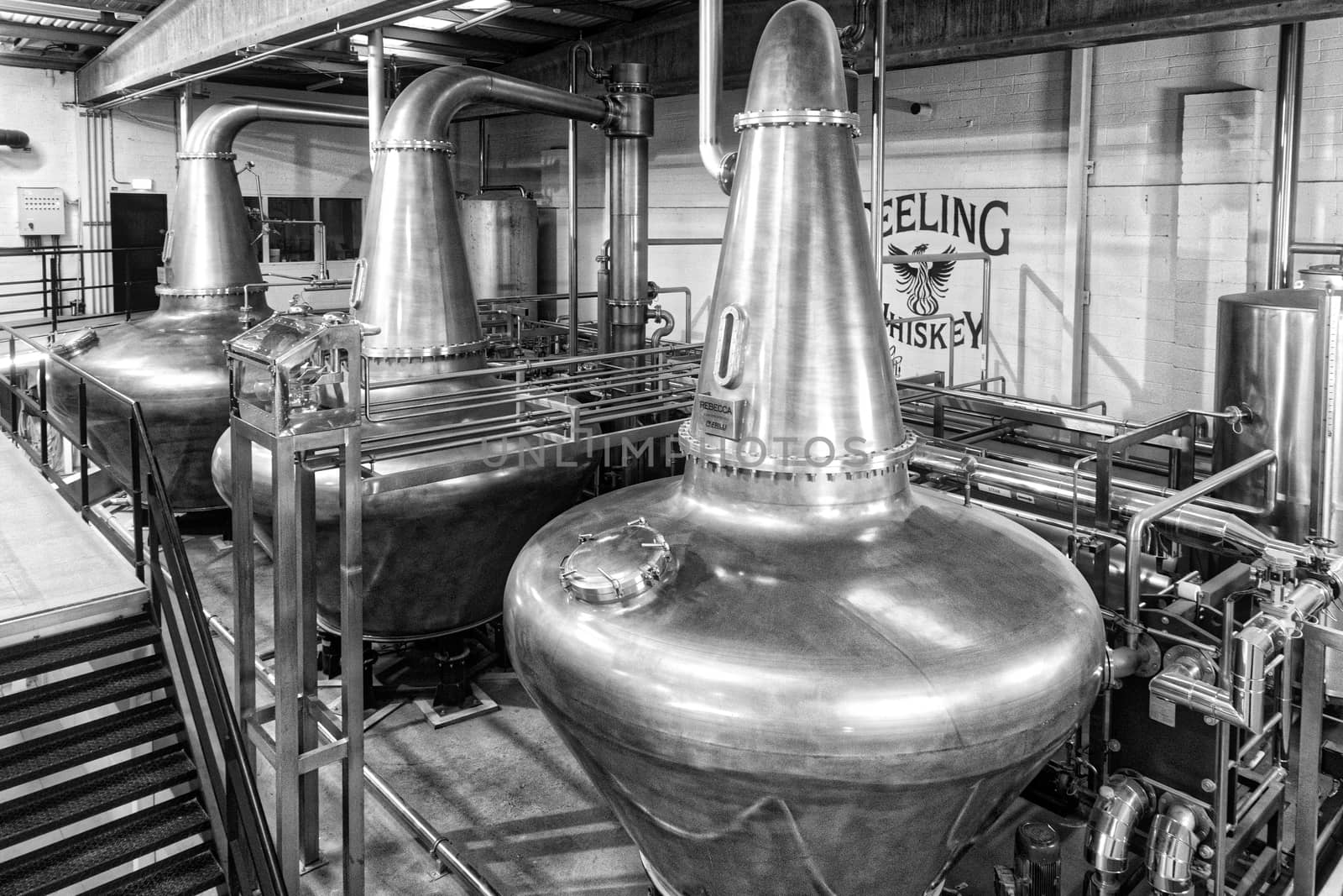 Dublin, Ireland, JAN 20 2017, These are the copper kettles of the Teeling Whiskey distillery . One of the original Dublin Whiskeys. Picture in Black and White
