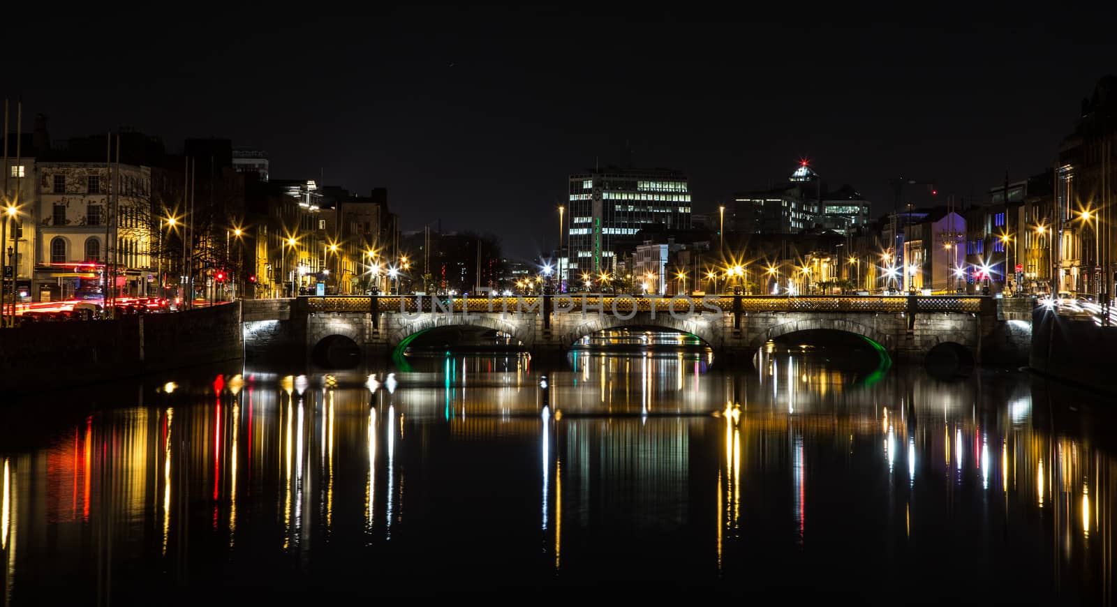Night picture of the river liffey and bridges Dublin Ireland reflections by mlechanteur