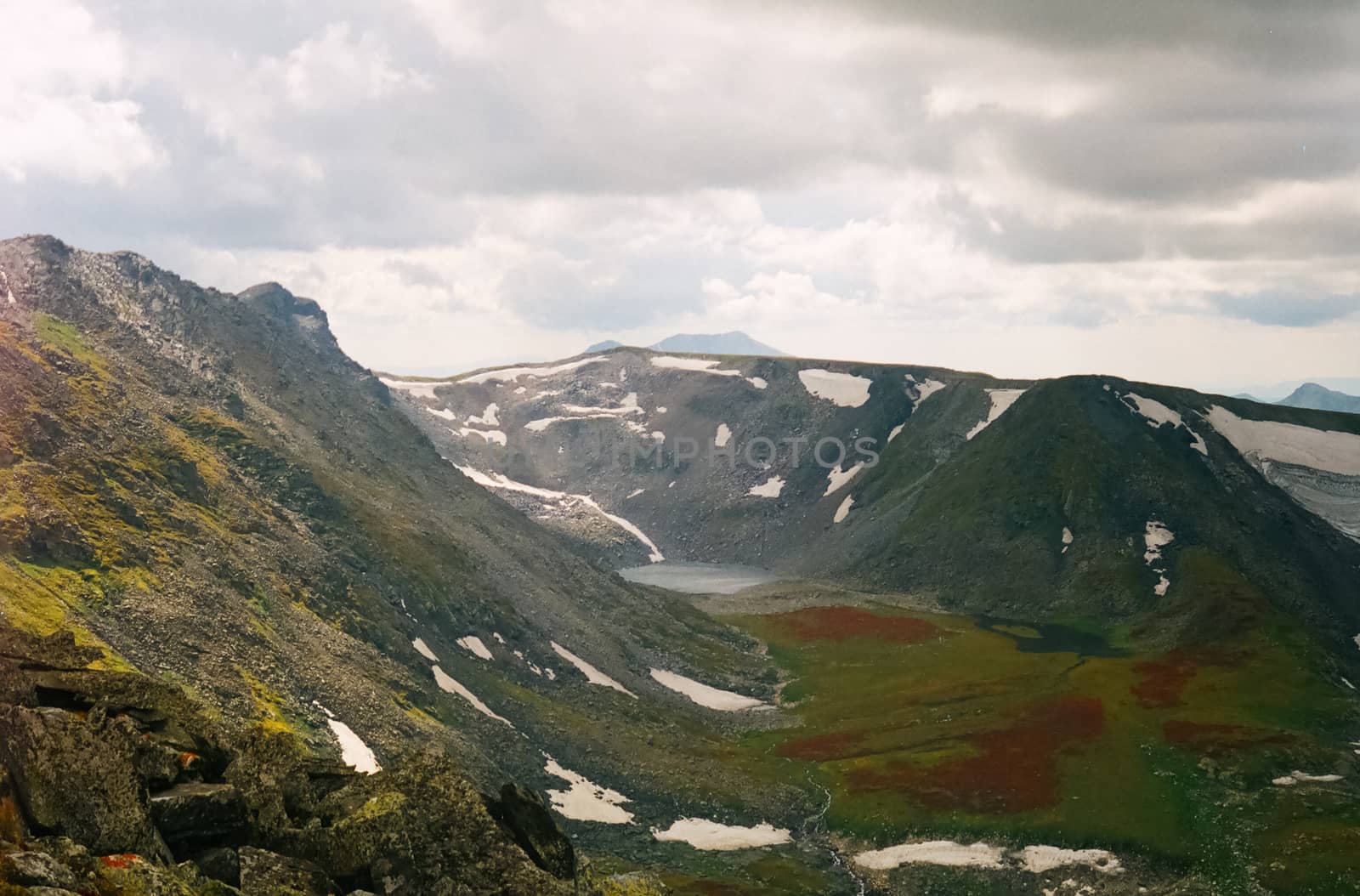 Nature is altai in spring. Melted snow in mountains. by DePo