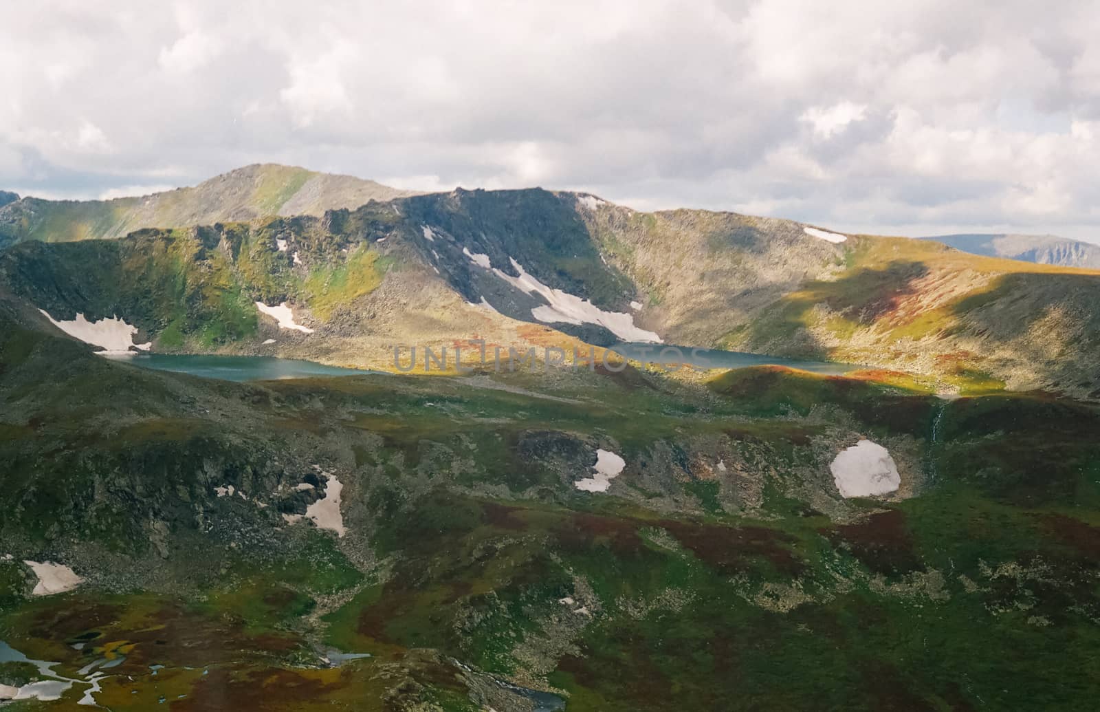 Nature is altai in spring. Melted snow in mountains. by DePo