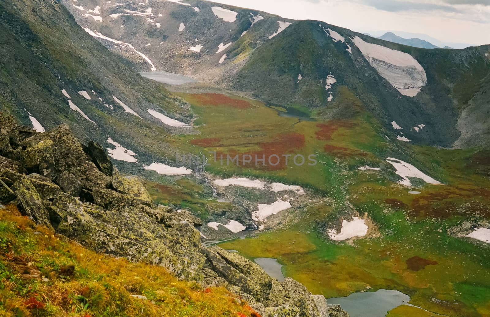 Nature is altai in spring. Melted snow in mountains. by DePo