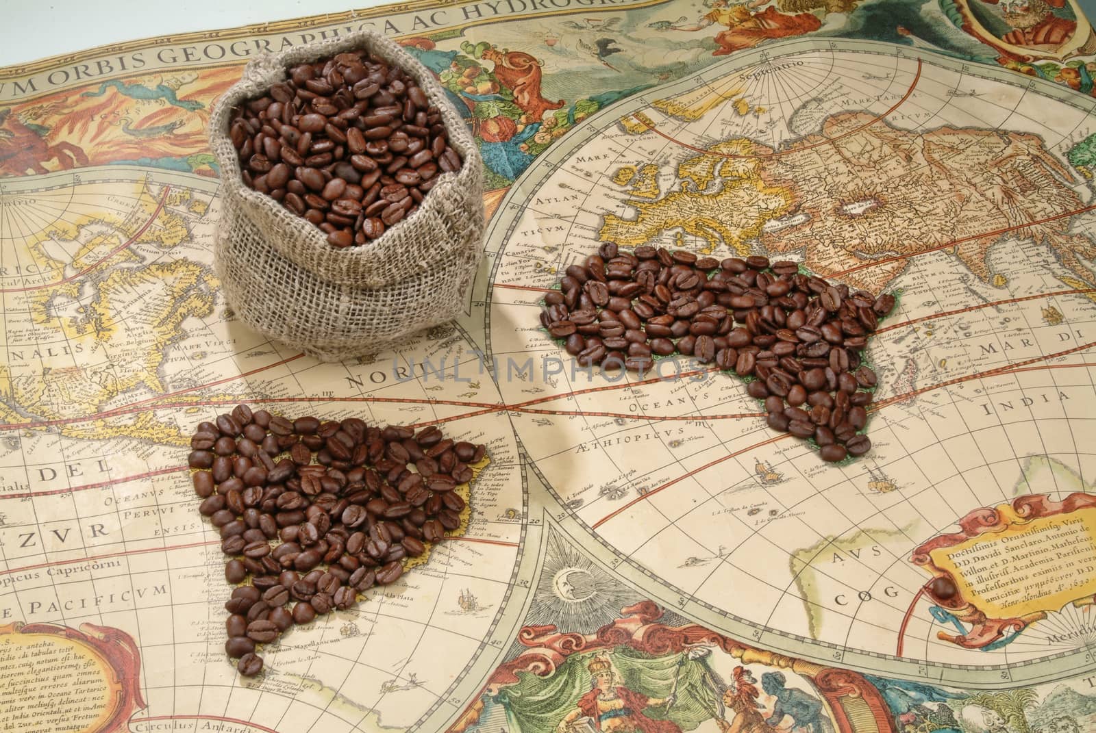 Coffee beans on an old copy ow world map