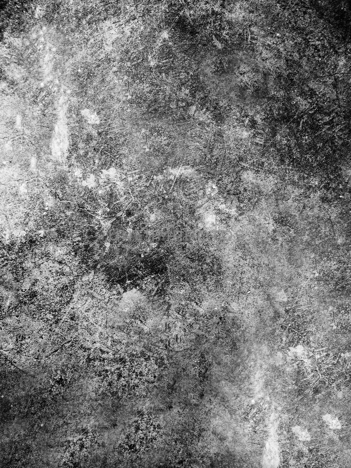 Stone base of the wall with a rough textured surface of dark color .Texture or background