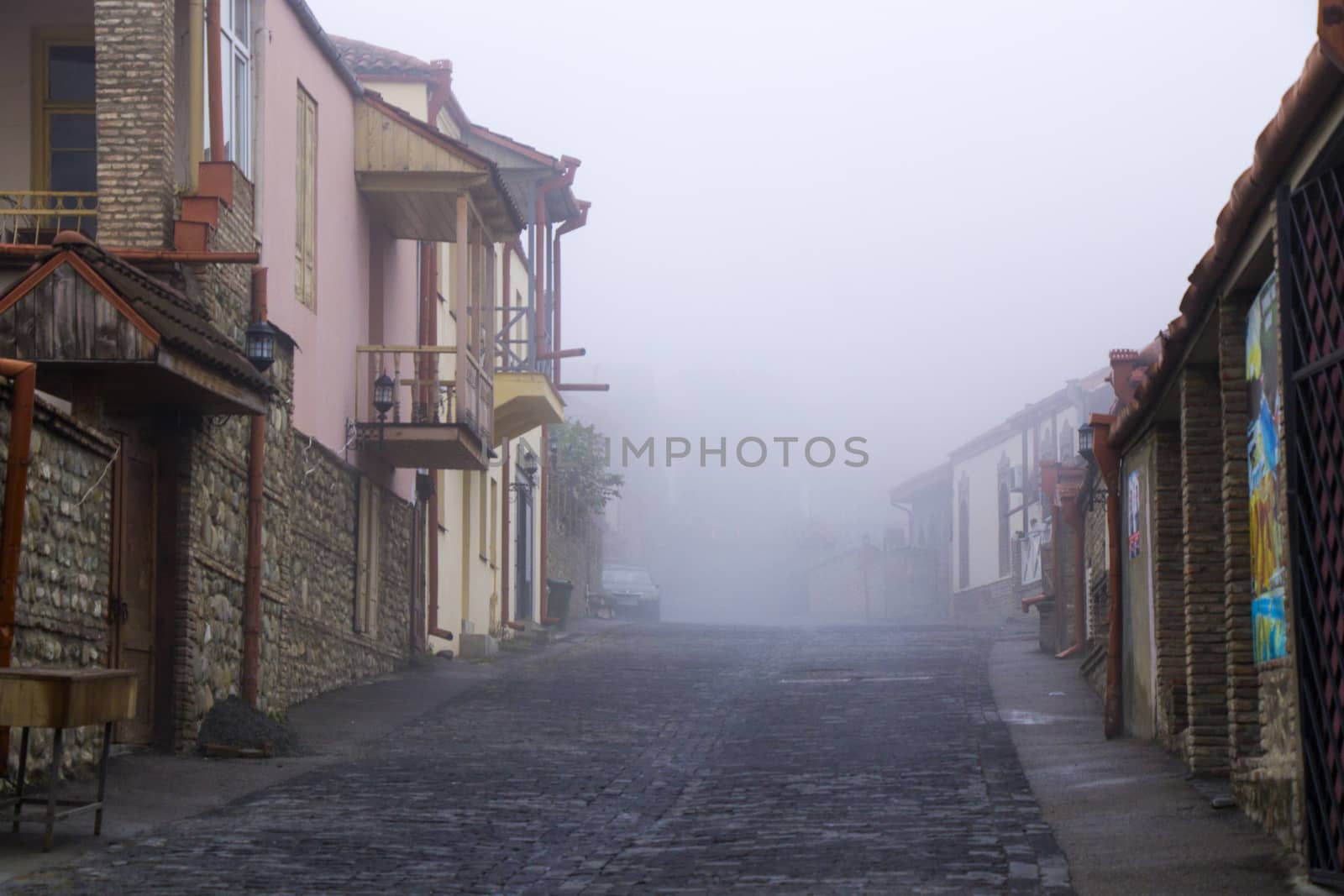 Sighnaghi village landscape and city view in Kakheti, Georgia. Old houses beautiful view during mist and fog