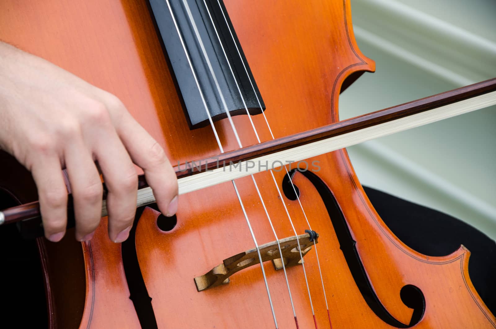 Art and artist. Young elegant man violinist playing violin on black. Classical music. little boy musical instrument.
