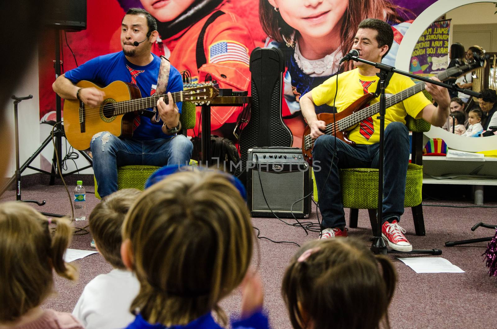 Lima, Peru - May 25th 2018: Musical Band for children Troly and El Lobito. The guys singing to children.