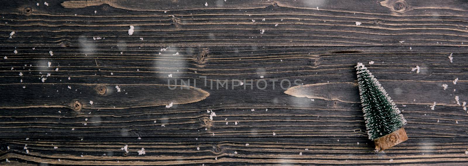 Christmas holiday composition decoration with pine tree on wooden background, new year and xmas or anniversary with presents on wood table in season, top view or flat lay, banner website.