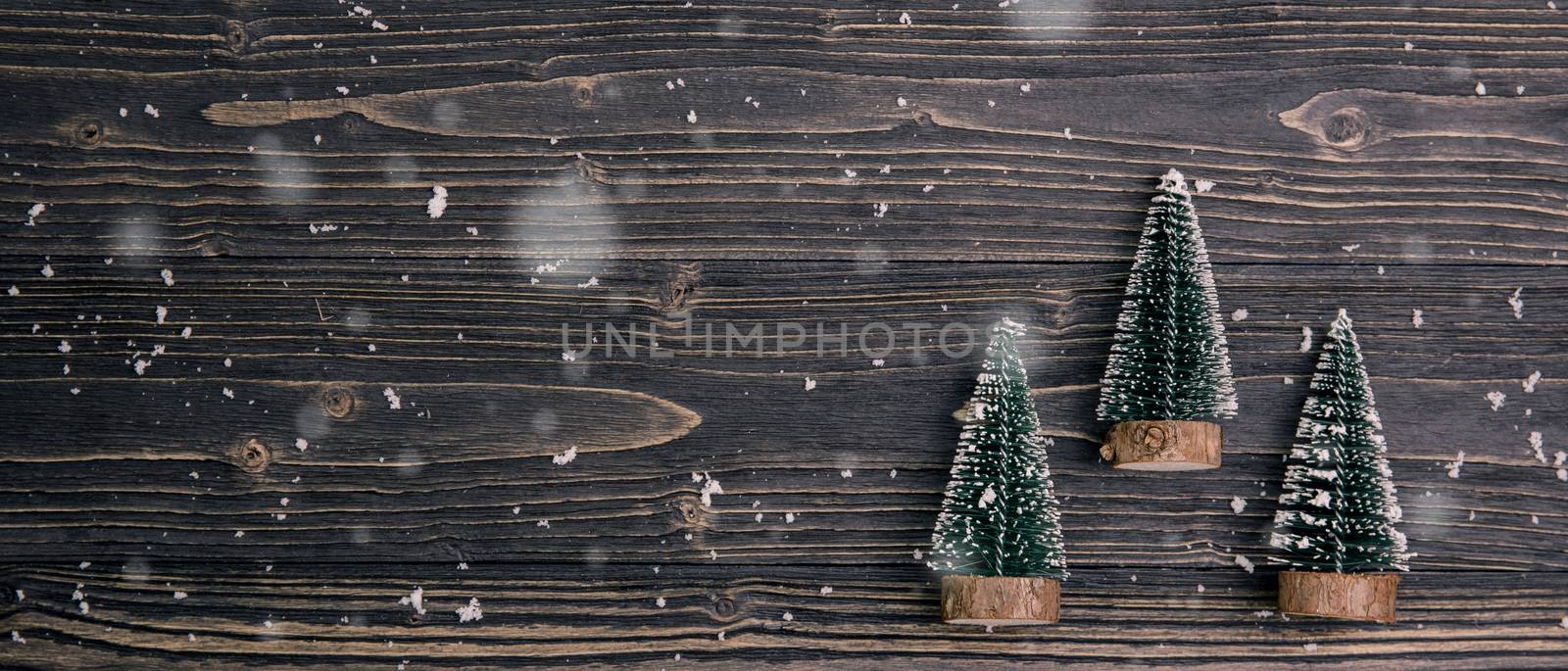 Christmas holiday composition decoration with pine tree on wooden background, new year and xmas or anniversary with presents on wood table in season, top view or flat lay, banner website.