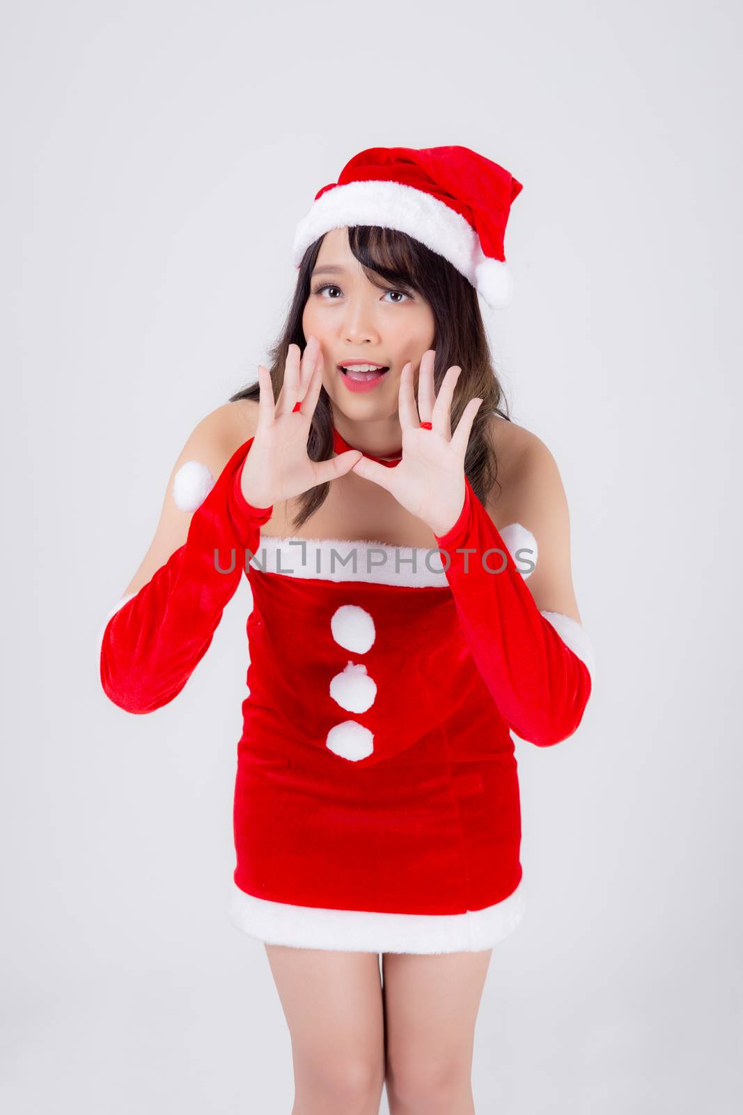Beautiful portrait young asian woman Santa costume shout sound loud for announce with excited and happy in holiday xmas, asia girl surprise celebrating in Christmas isolated on white background.