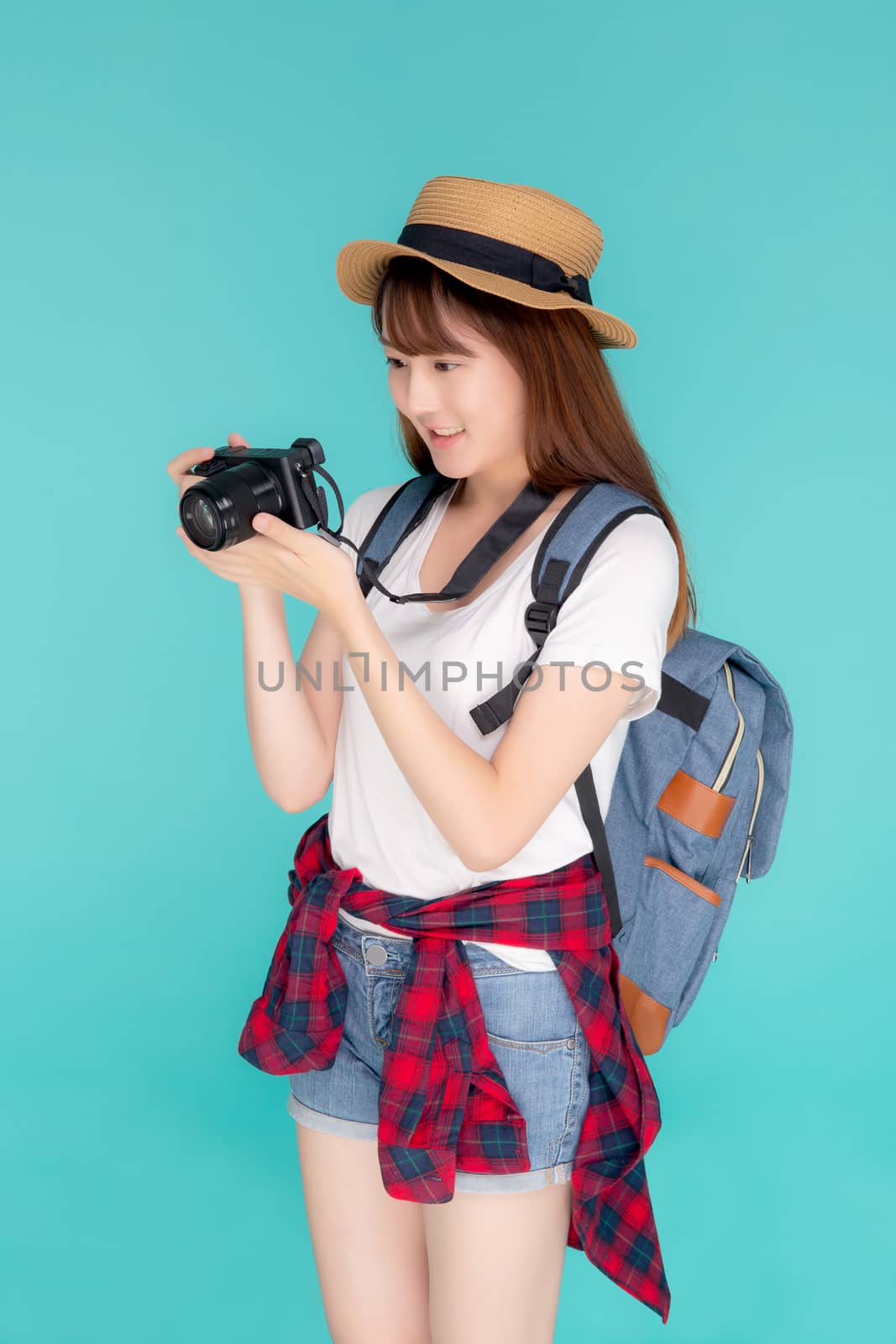 Beautiful young asian woman cheerful and enjoy travel trip summe by nnudoo