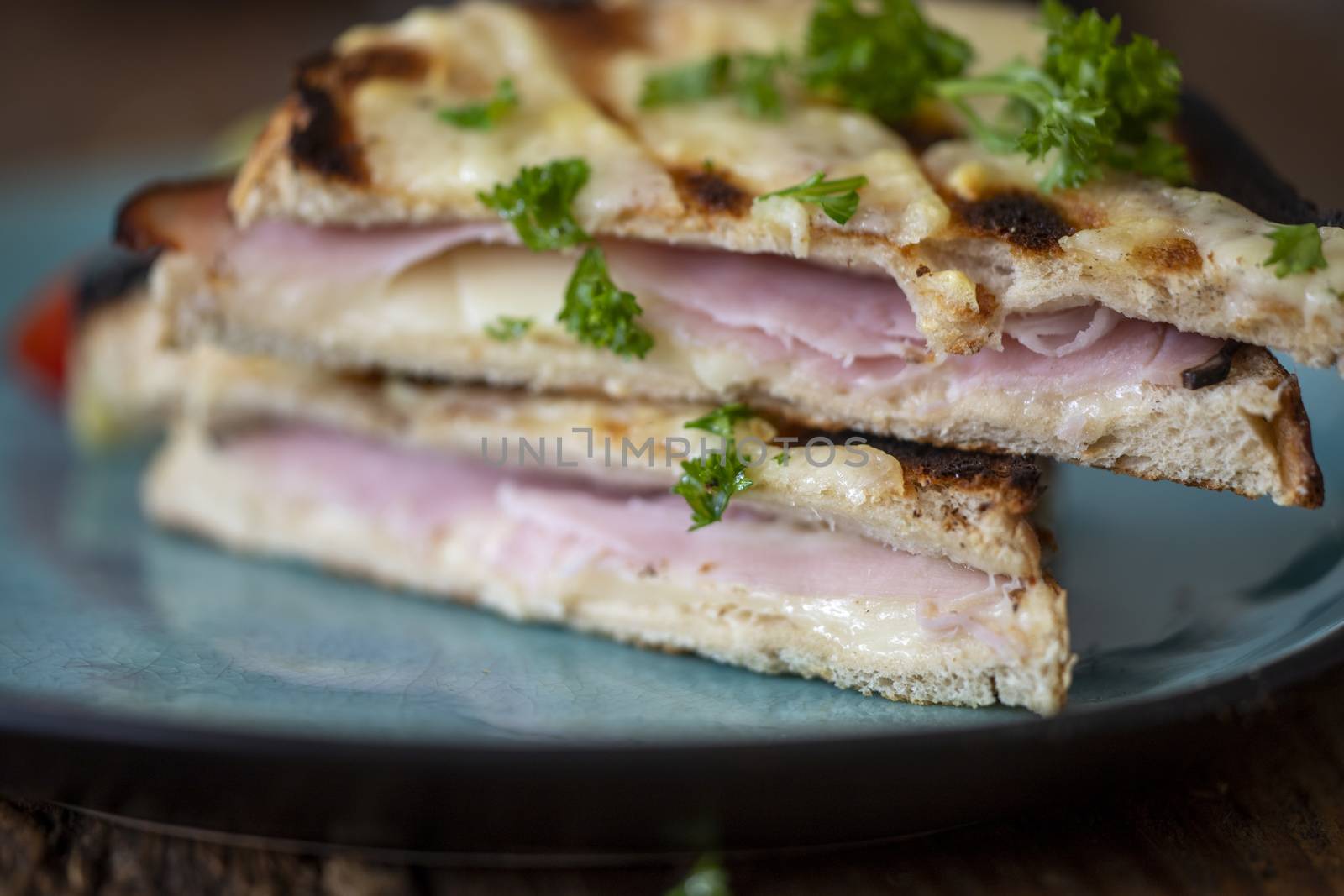 french croque monsieur on a blue plate