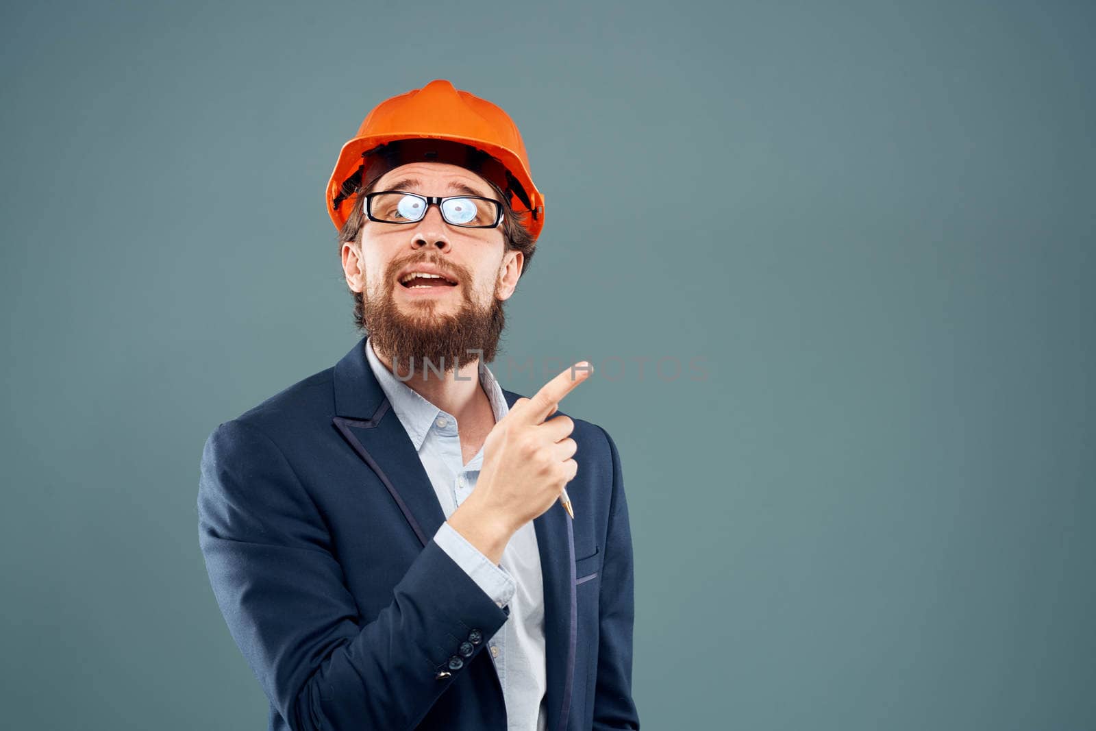 Cheerful man with glasses construction safety by industry professional lifestyle. High quality photo