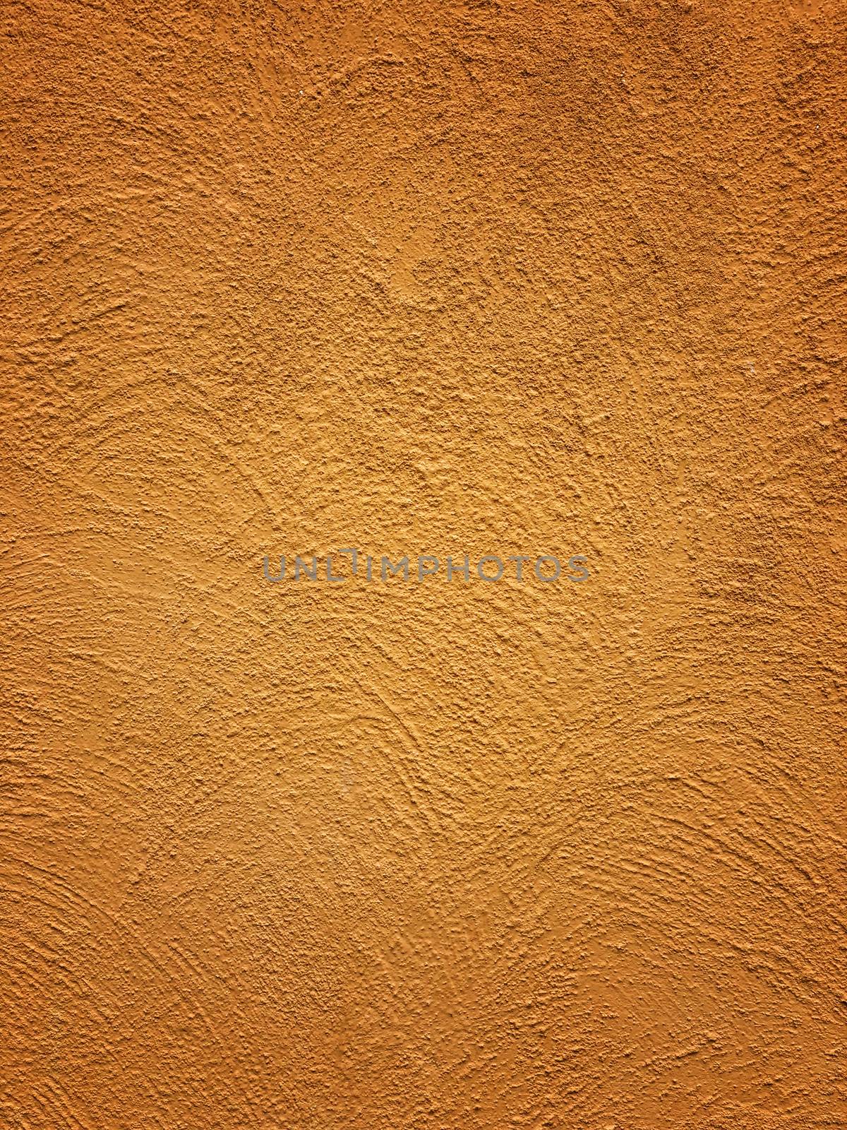 Orange cement wall detail and texture. by Surasak