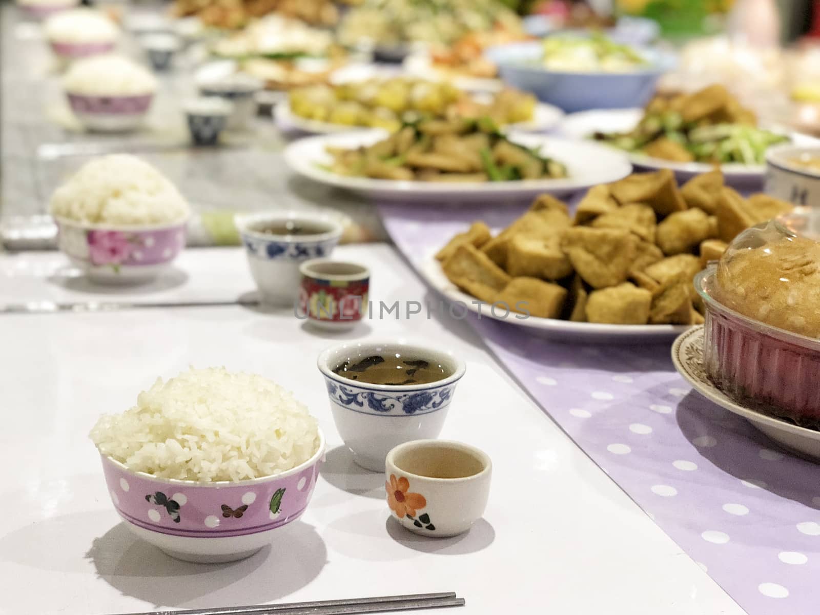 Chinese Ghost Festival. Sacrificial offering food for pray to go by Surasak