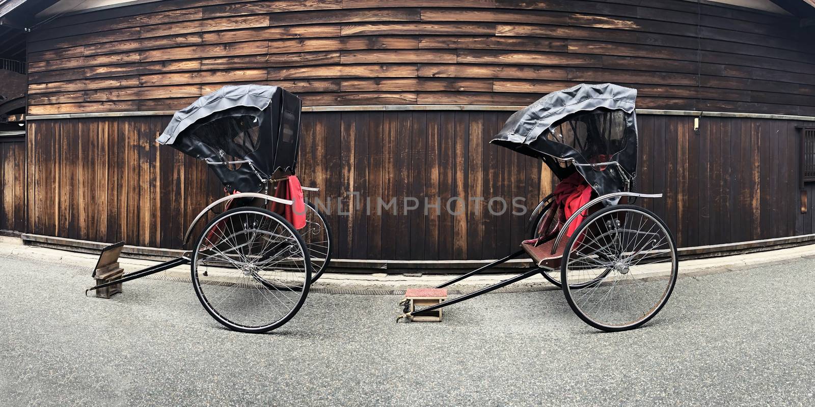Ancient Japanese Tricycles at shopping street in takayama, Japan by Surasak