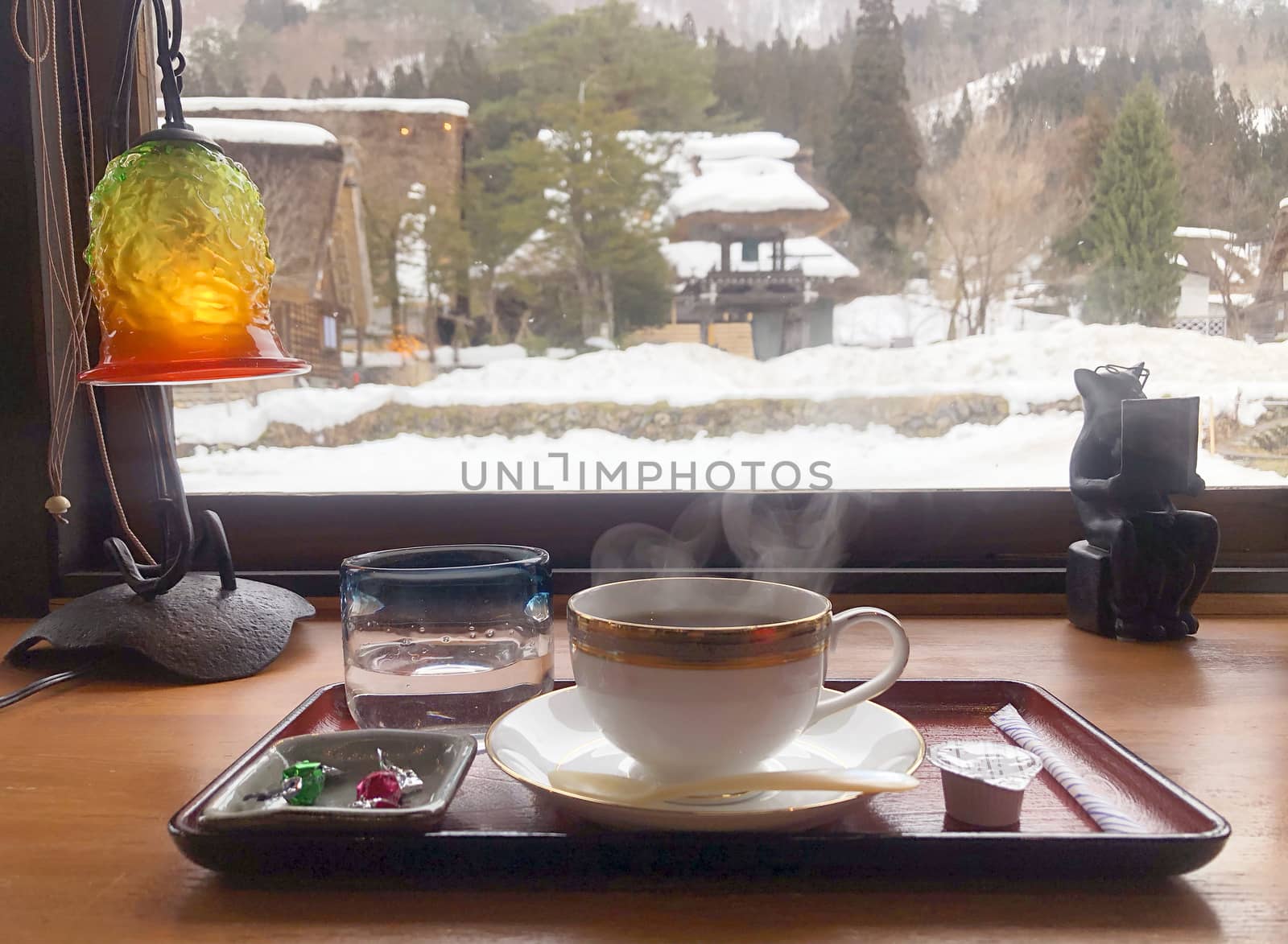 Coffee in the morning  and enjoying the winter snow view at Shirakawago village, Gifu, Japan.
