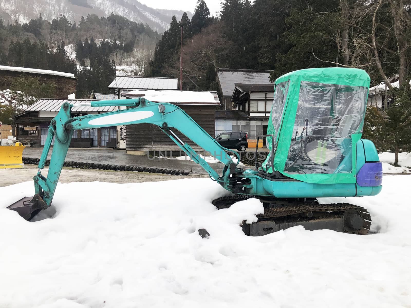 Snowplow Truck Remove the Snow in Shirakawago, Japan
 by Surasak