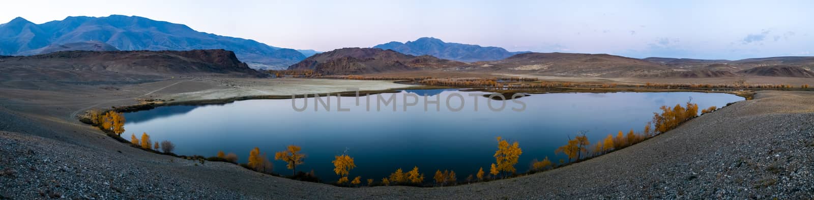 Lake in Altai Mountains. Panorama of the Altai landscape in the mountains. The time of year is autumn. by DePo