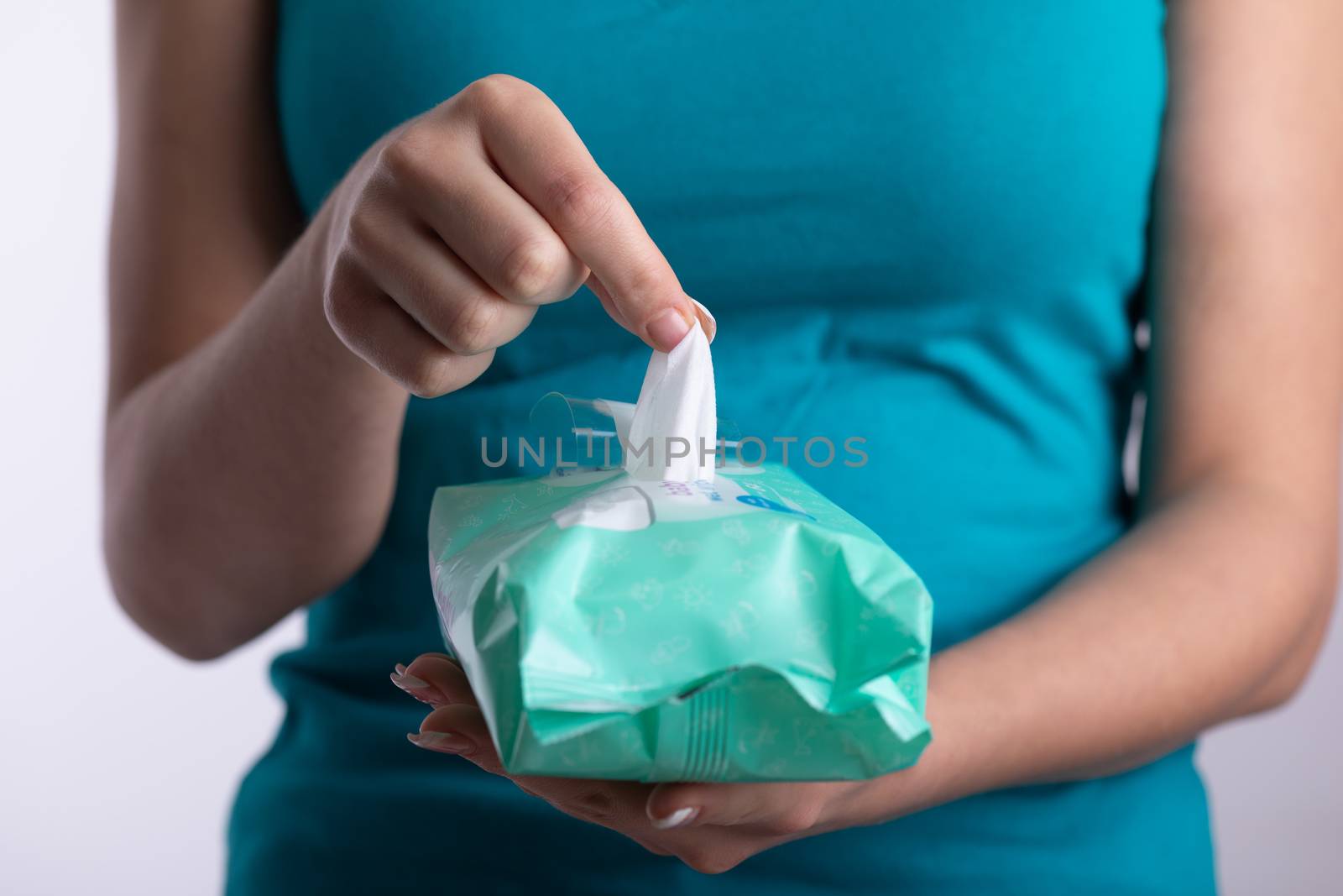 Taking baby wipes from the packaging - hygiene procedure and pre by adamr