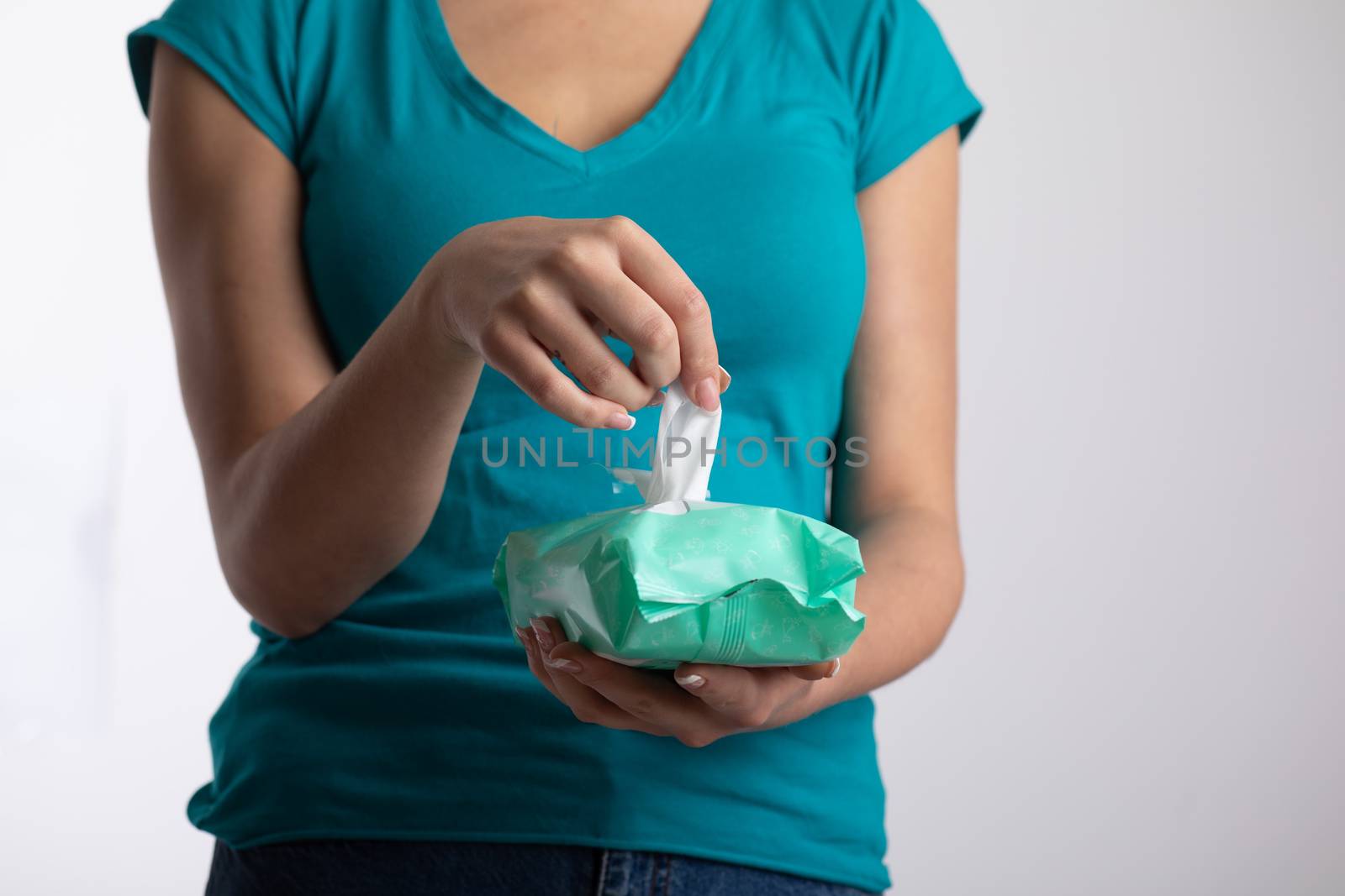 Taking baby wipes from the packaging - hygiene procedure and pre by adamr
