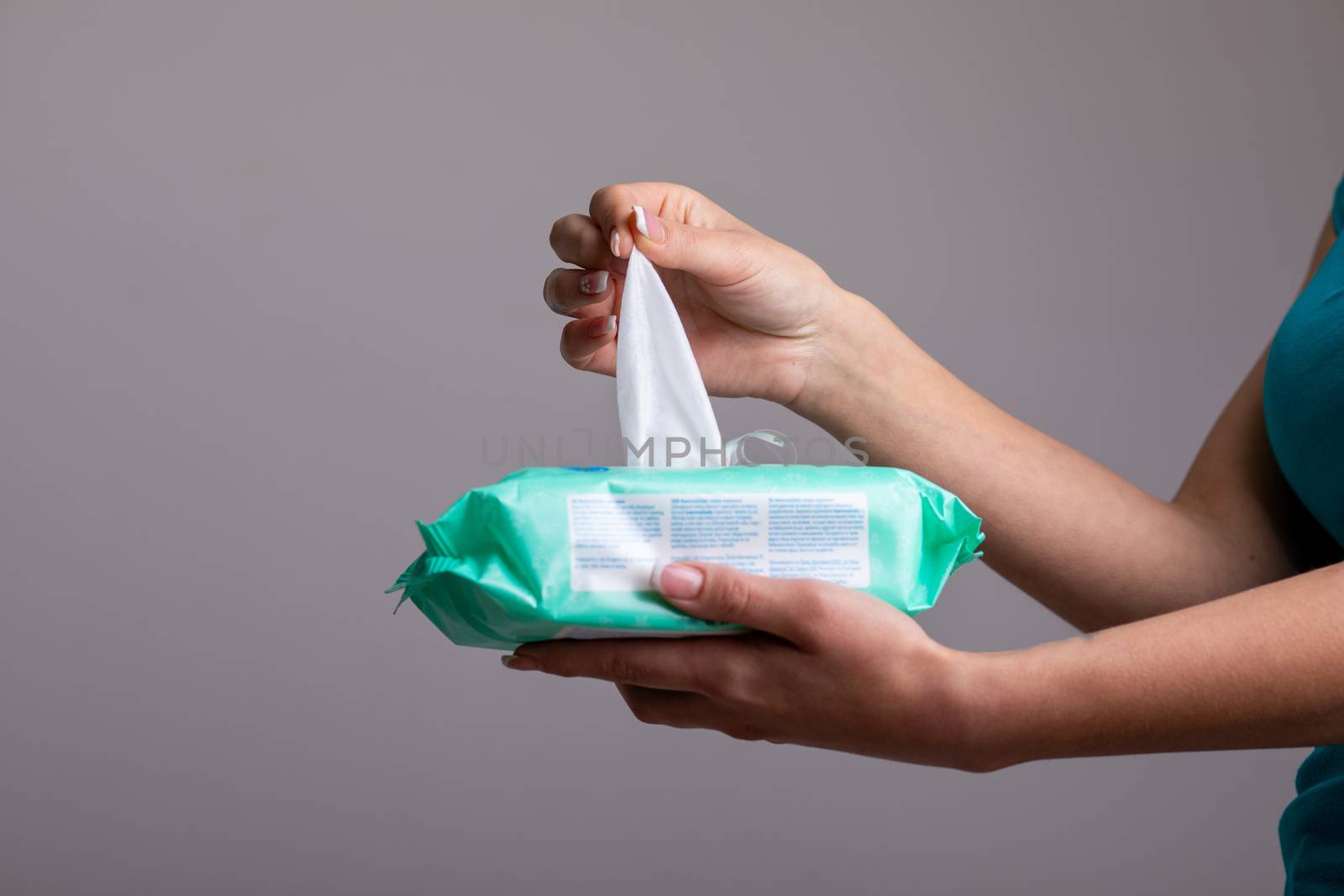 Taking baby wet wipes from the packaging - hygiene procedure and prevention of infectious diseases