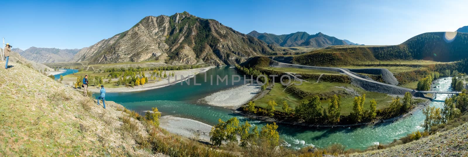 Panorama is the Altai, a mountain river flowing between the Altai mountains and the nature of the area.