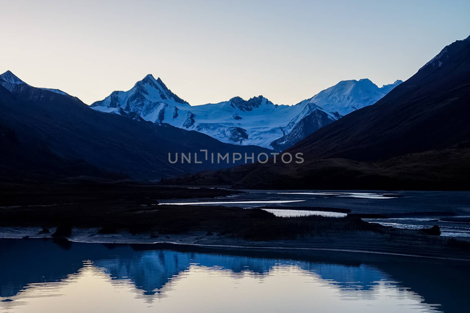 Mountain lake among the mountains on altai. The water surface of the lake.
