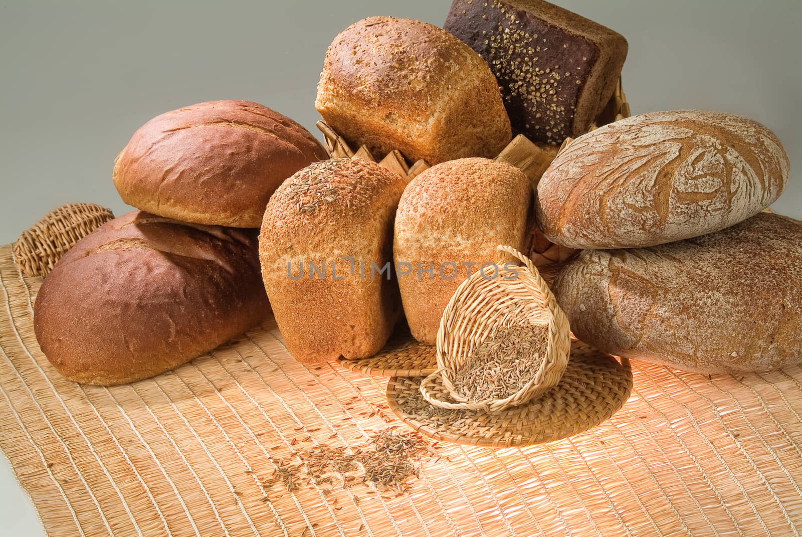 Different kinds of bread on a studio background