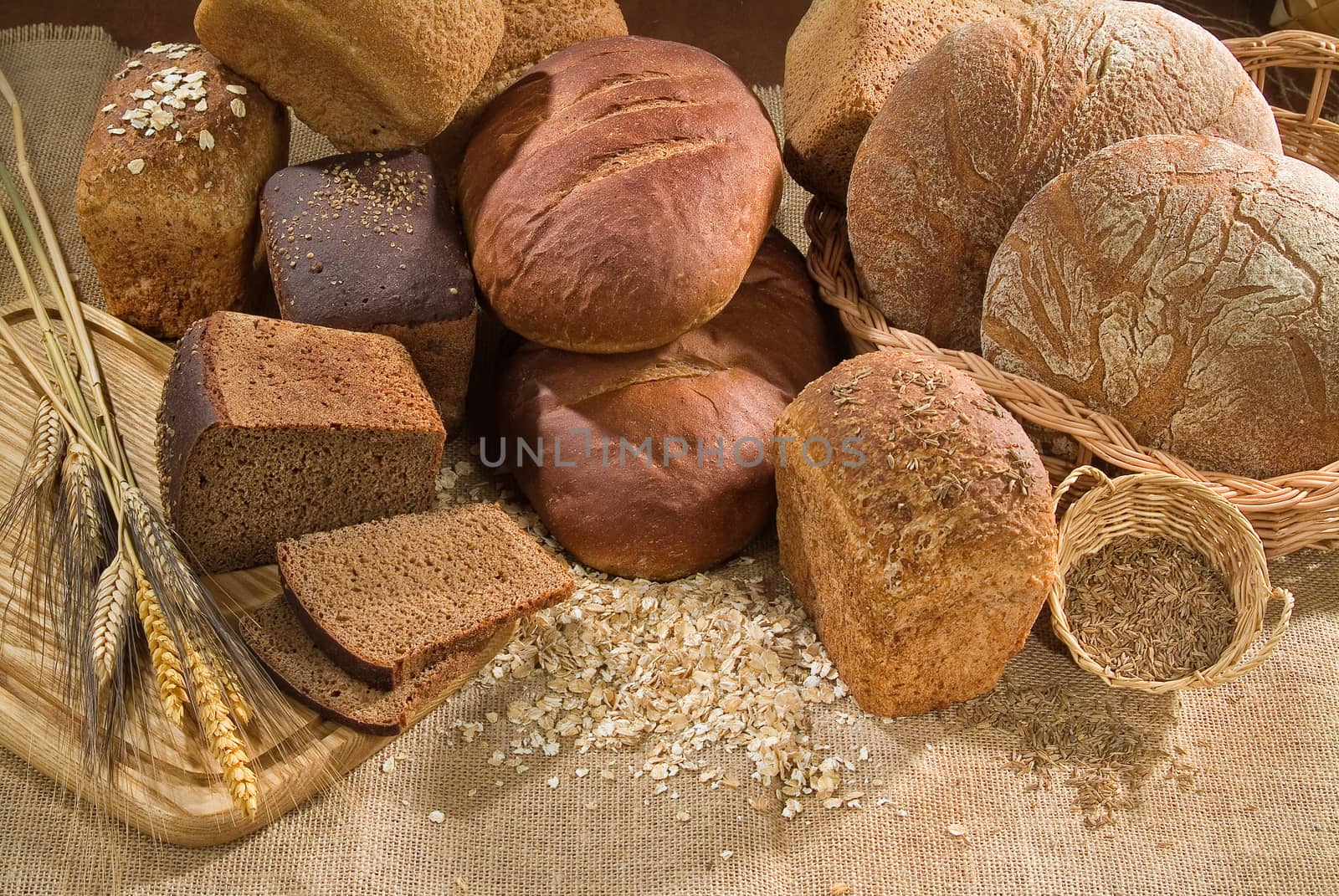 Different kinds of bread on a studio background