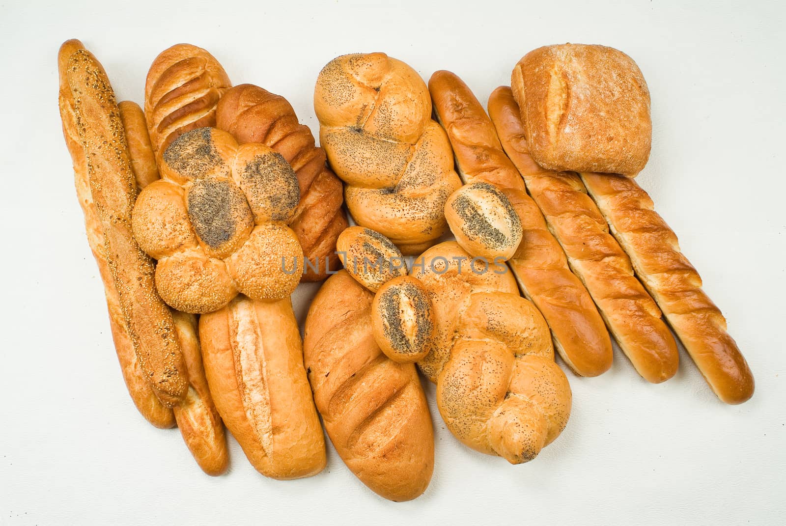 Different kinds of bread on a studio background