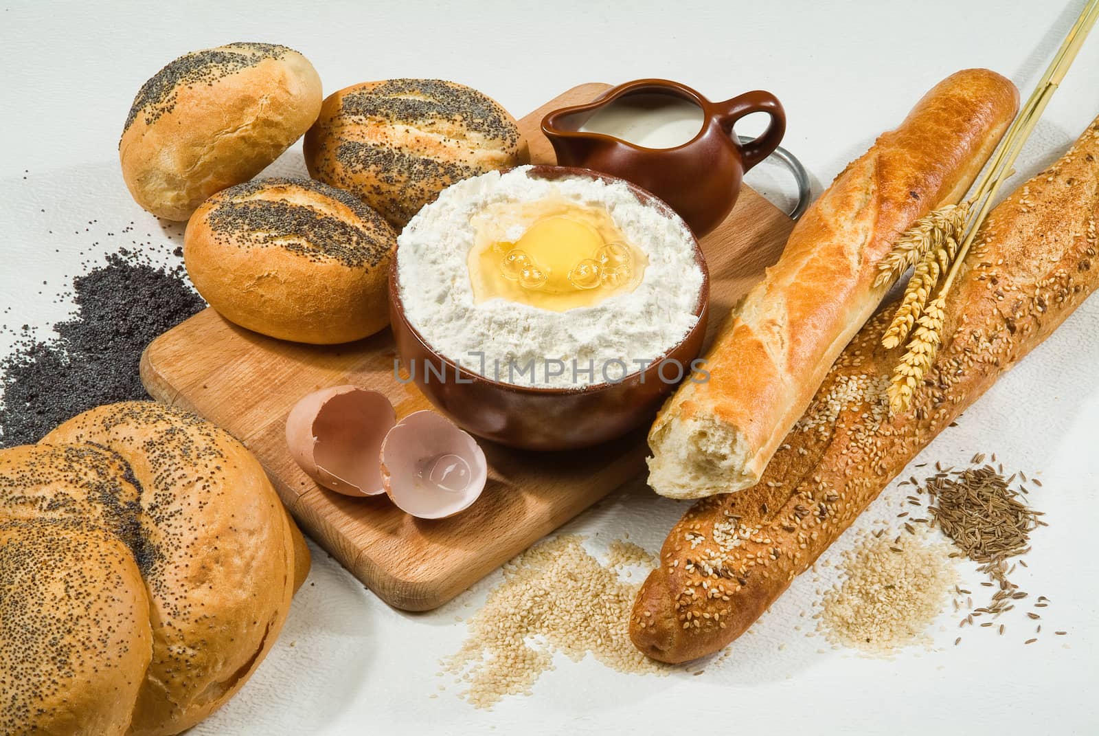 Different kinds of bread on a studio background