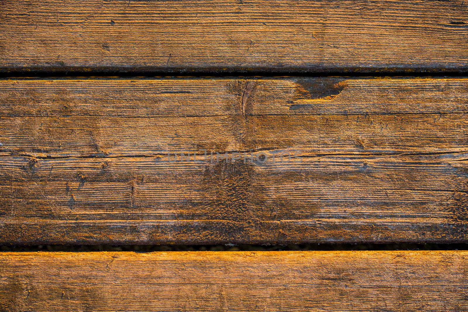 dusty wooden planks without paint under sundown light flat background