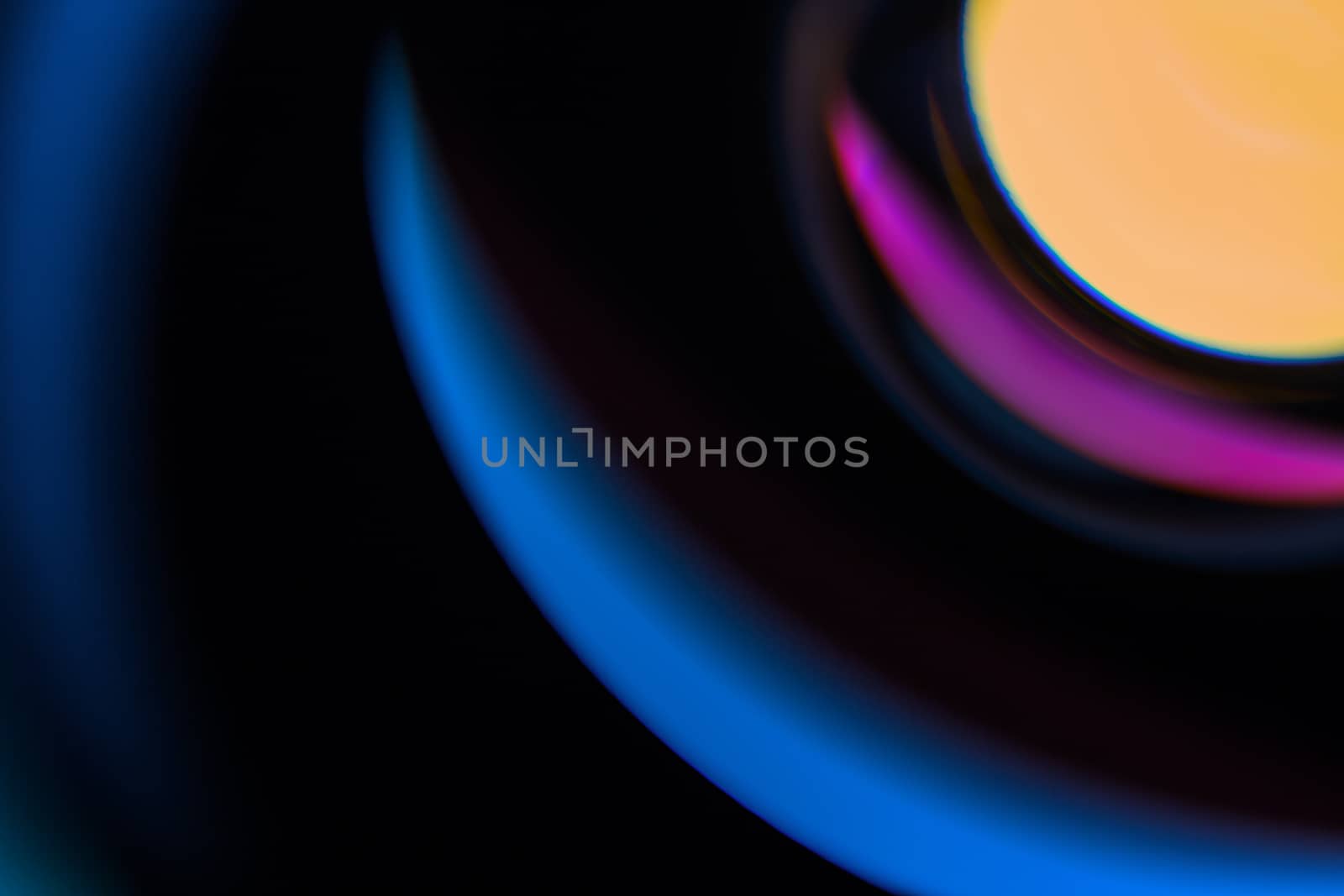 abstract dark round blur, made from back lighted defocused lens system