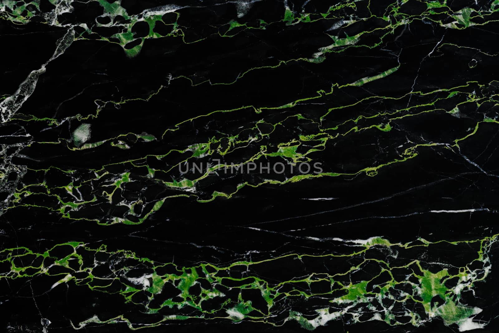Black and green natural marble flat surface close-up texture