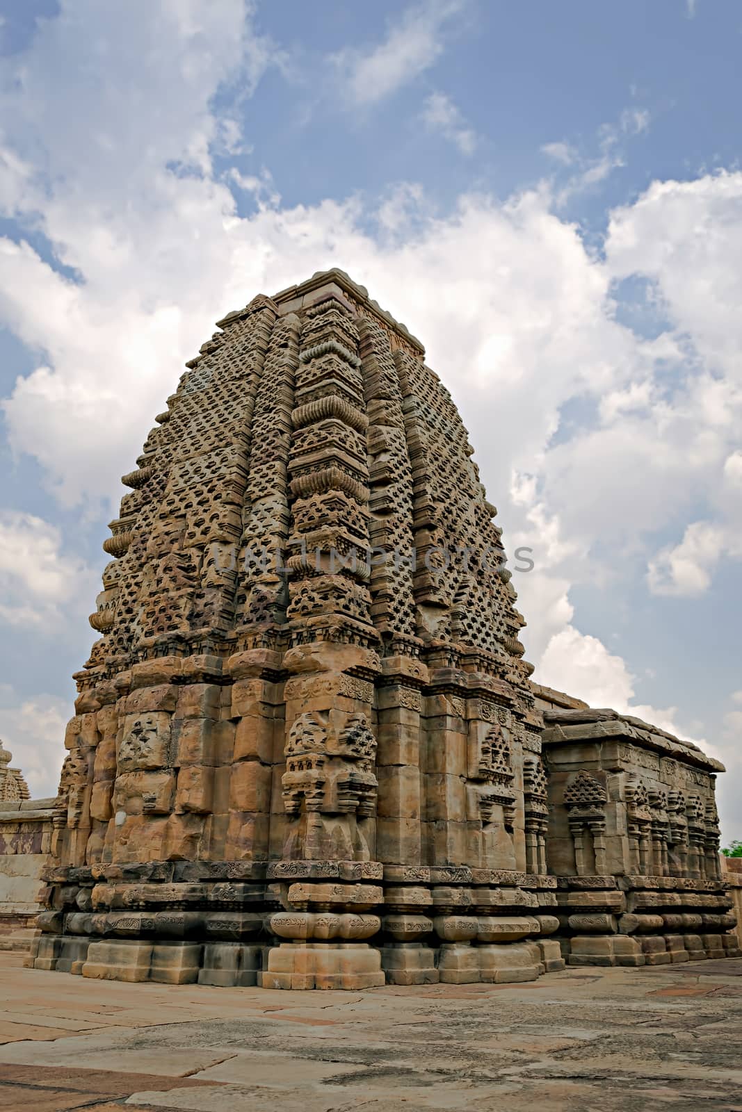 Stone carved ancient Virupaksha temple with intricate carvings at, Pattadakal, Karnataka, India.