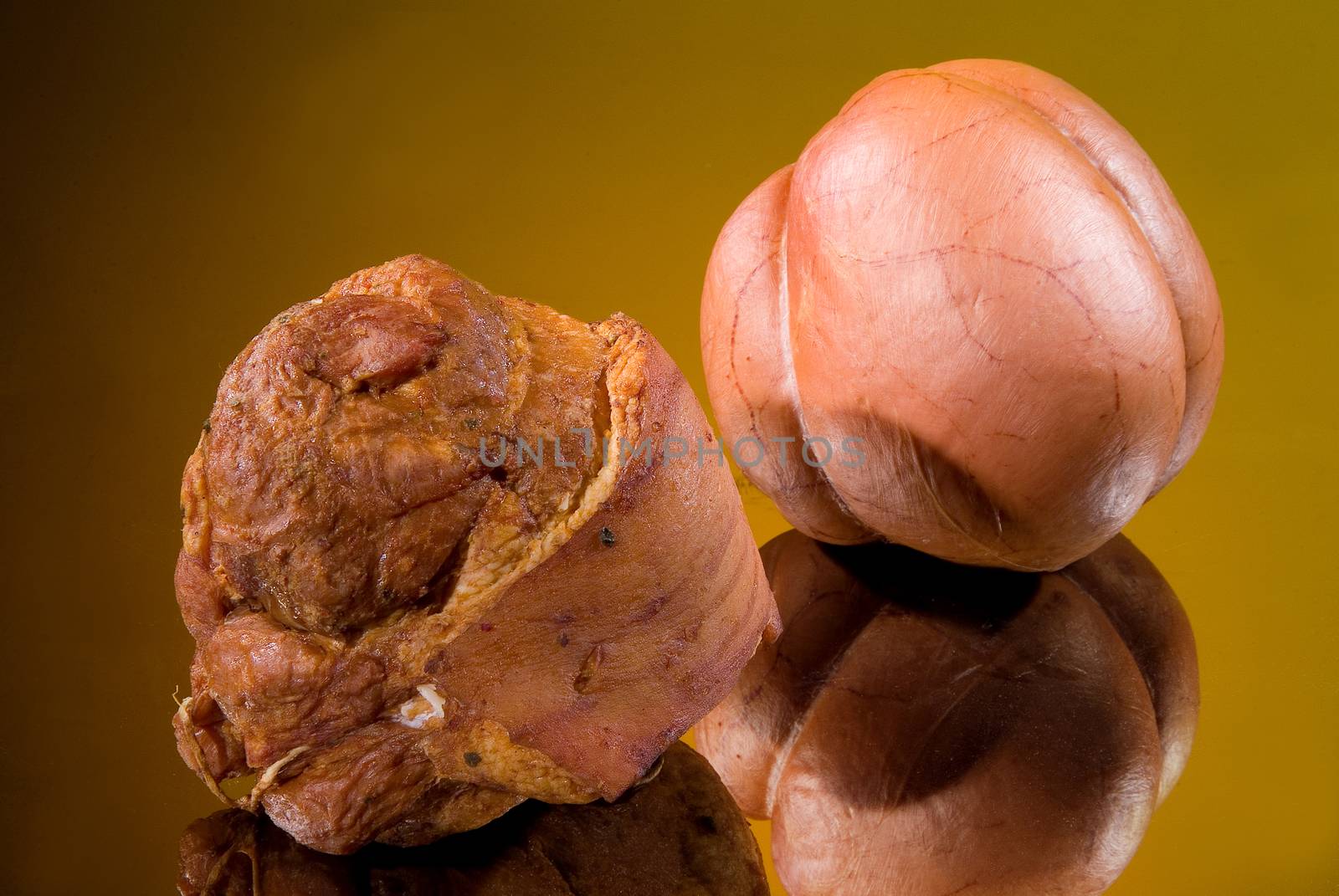 Sausages on a black glass background