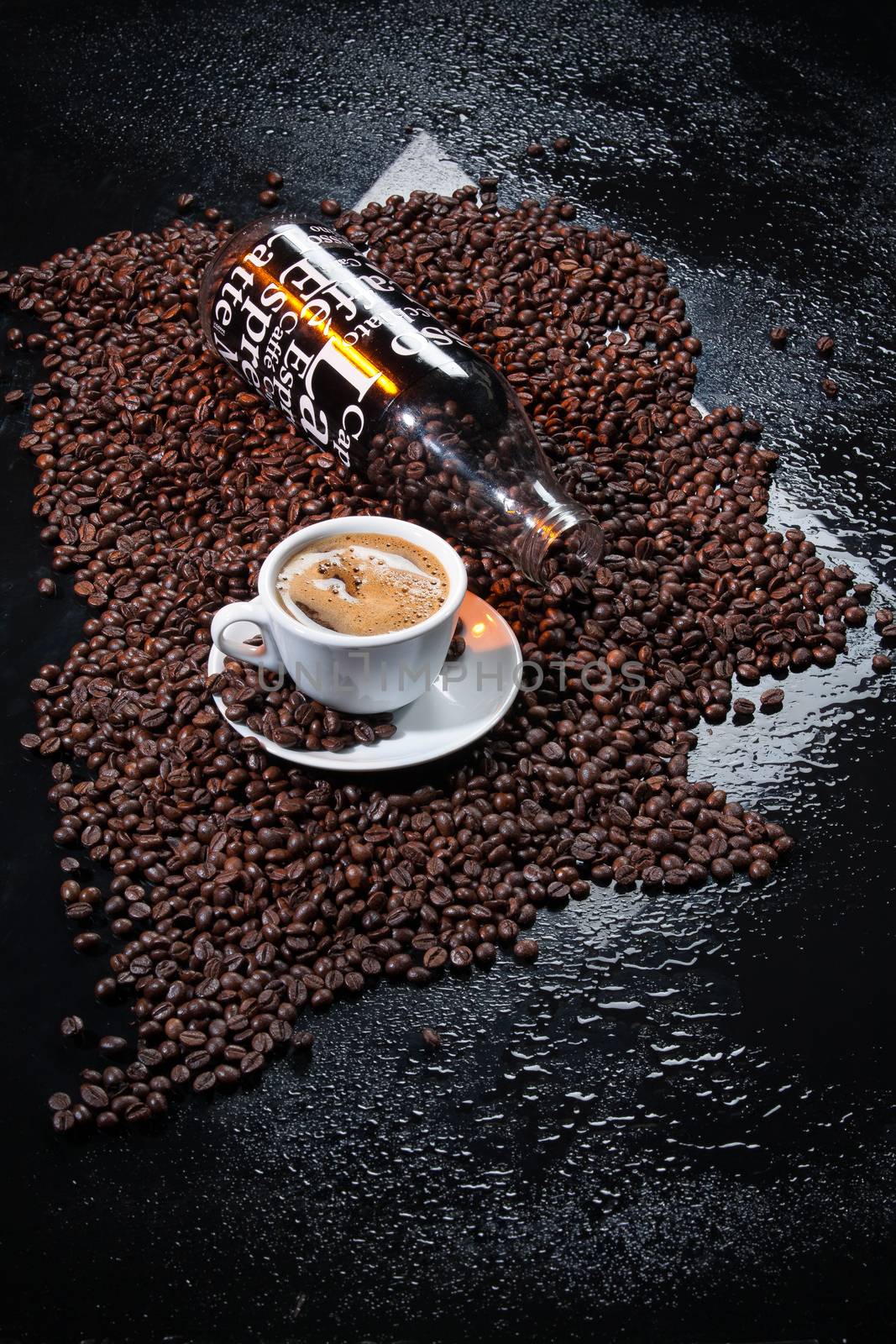 Coffee and coffee beans ona studio background