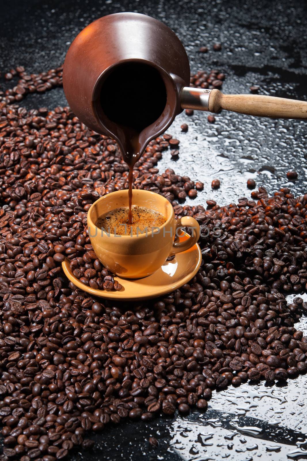 Coffee and coffee beans ona studio background