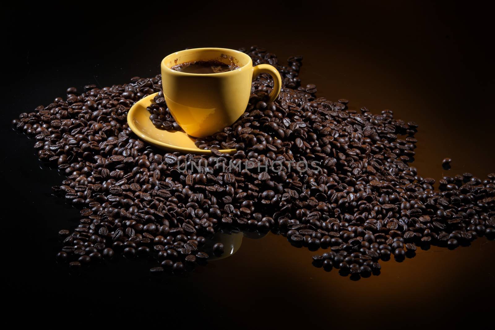 Coffee and coffee beans ona studio background