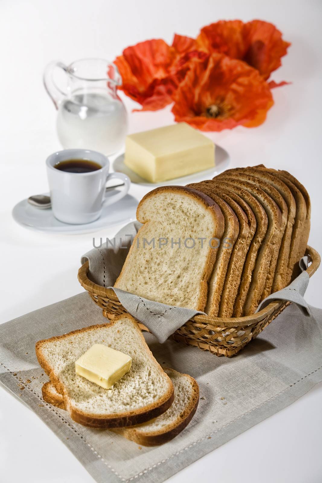 Bread, glass of milk and poppy