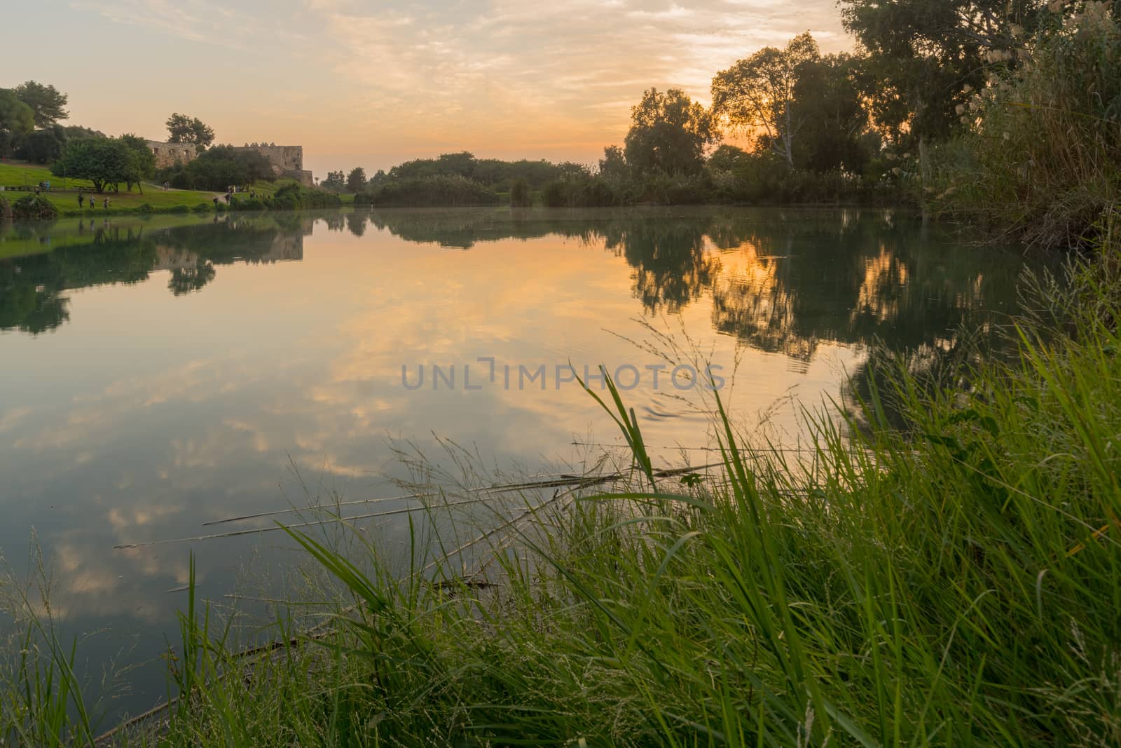 Sunset with lake, Antipatris Fort, Yarkon (Tel-Afek) National Pa by RnDmS